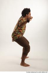 Garson STANDING POSE WITH SPEAR AFRO